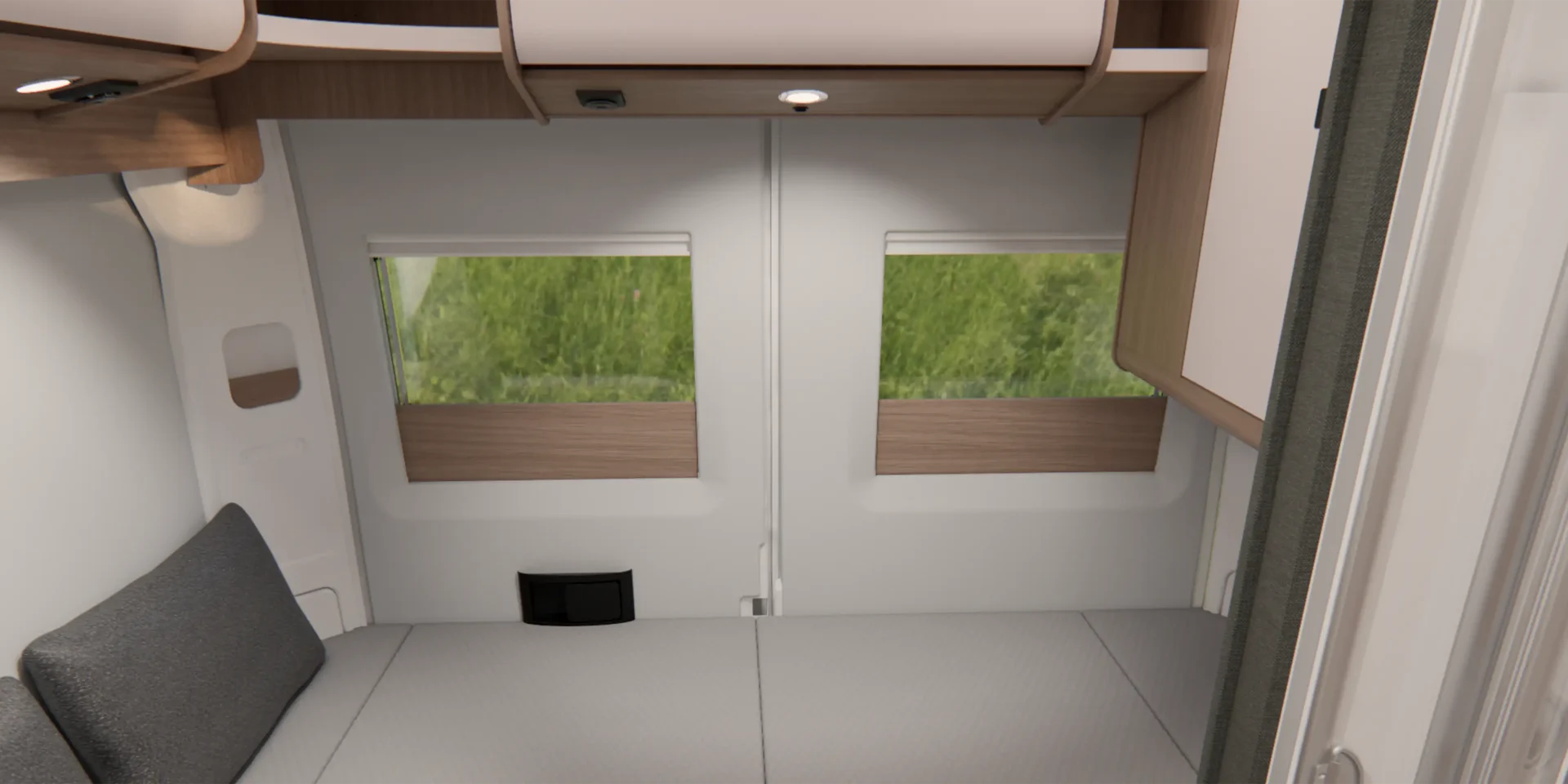 Innenansicht des Schlafbereiches mit Längseinzelbetten eines Malibu Campervans.